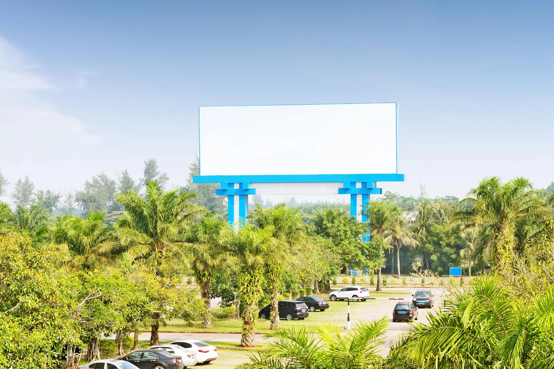 Large outdoor digital billboard in a bright public environment